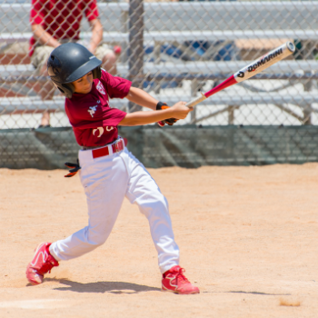 Child playing baseball